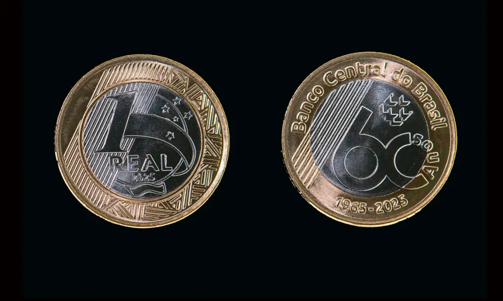 A imagem atual não possui texto alternativo. O nome do arquivo é: Moeda-60-anos-BC.webp